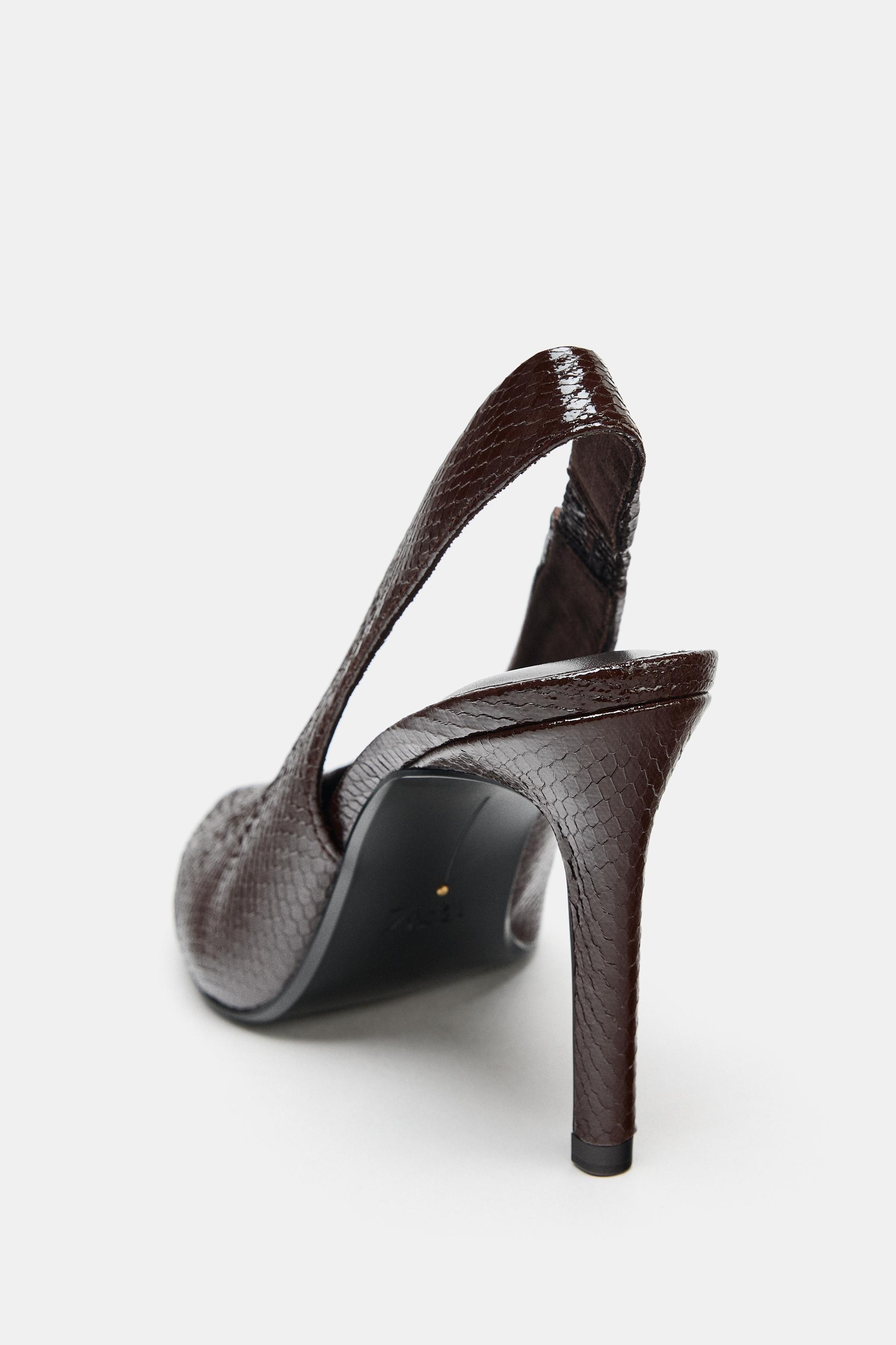 EMBOSSED ANIMAL PRINT HEELS